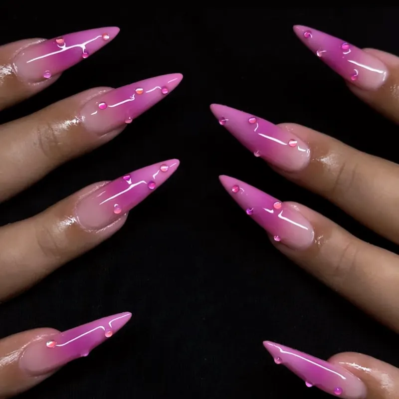 Pink jelly stiletto nails with chrome lines and 3D water drops